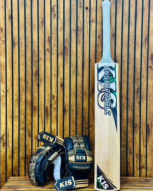 A cricket bat and matching cricket gloves displayed against a vertical wooden slat wall. The bat is light natural wood with blue, white, and black graphics reading 'UNSTOPPABLE', and the gloves are dark navy with gold and white 'KIS' and 'UNSTOPPABLE' branding.