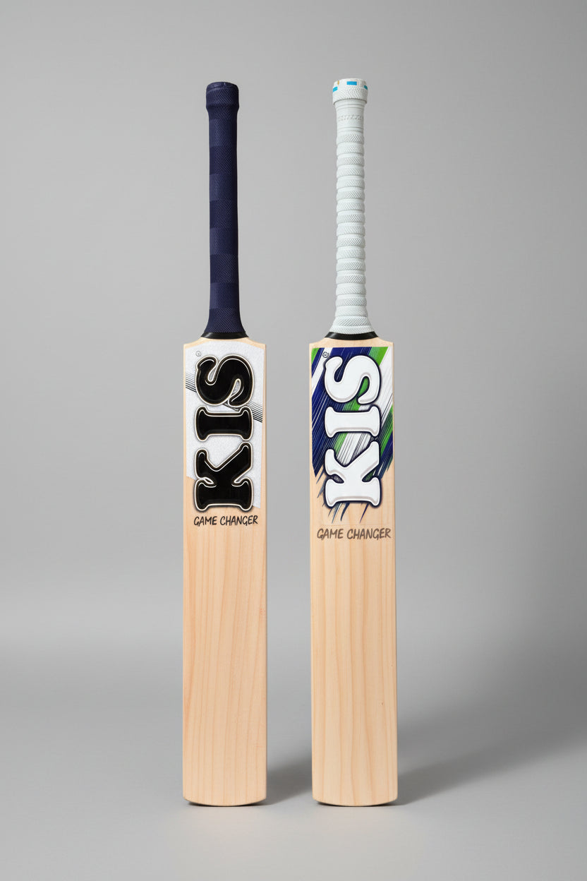 Two cricket bats with 'KIS' branding on a wooden pallet background